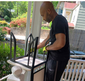 a man fixing a chair
